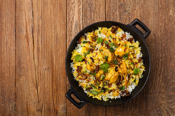 Biryani with chicken. Traditional Indian dish of rice and chicken marinated in spices and yoghurt.