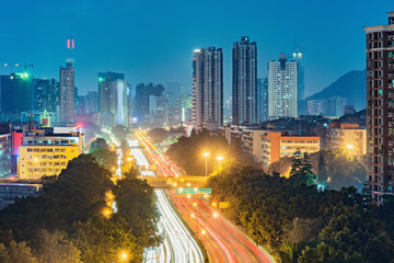 Fototapeta na wymiar Road in the city district at evening time. Shenzhen. China.