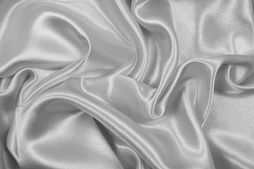 Smooth elegant gray silk or satin texture can use as abstract background