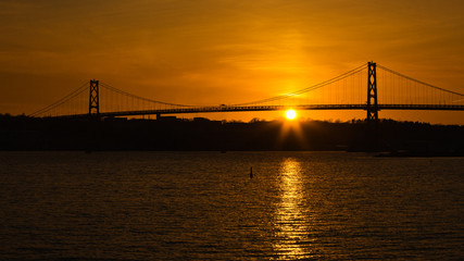Angus L. Macdonald Bridge at sunset. The span connects Halifax and Dartmouth, Nova Scotia.