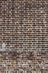 Old large weathered distressed brown stone red brick wall background