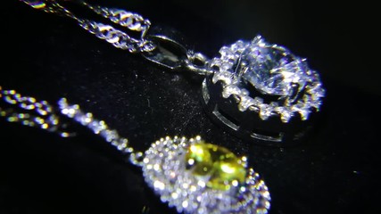 Synthetic diamonds on the jewelry spinning shot close-up - Powered by Adobe