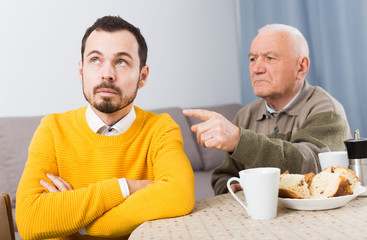 Aged father teaches his son