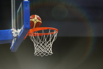 Basketball ball flies into the basketball hoop. Toned © makedonski2015