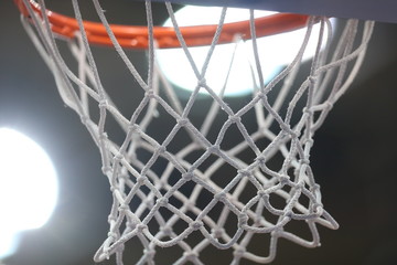 Close-up of mesh basketball hoop. Toned © makedonski2015