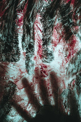 Dirty bloody creepy marks with shadow of hand abstract background