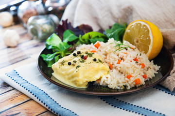 Andalusian fish, saffron rice with vegetables