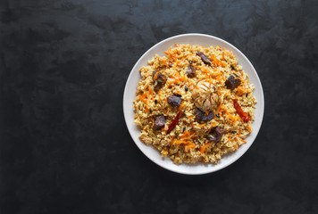 Lamb pilaf with rice. Asian cuisine. Top view.