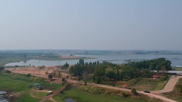 Aerial view Thepsuda Bridge over Lampao Reservoir.Thep Sada Bridge the Deja Vu Bridge is a 2-lane reinforced concrete bridge across Lam Pao Dam at Kalasin,Thailand.