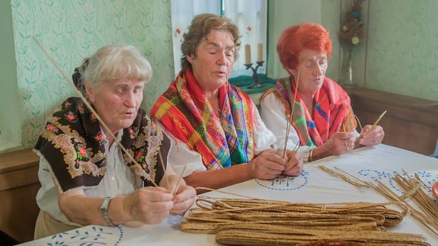 The ladies are already retired. However, they are full of life and look very vital. They are singing and are doing some house chore at the same time.
