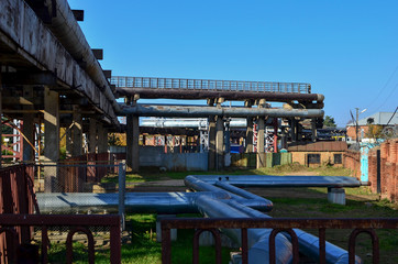 Industrial cables and pipes in a thermal power plant.