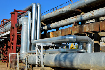 Industrial cables and pipes in a thermal power plant.