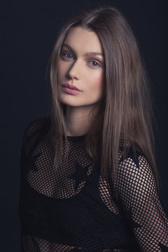 portrait of young woman. no makeup. model. black. smile