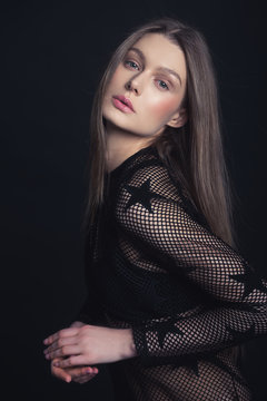 portrait of young woman. no makeup. model. black. smile
