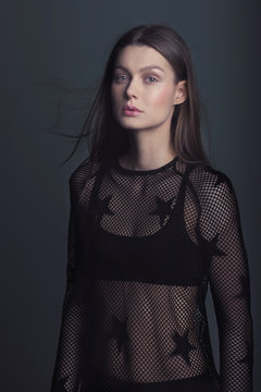 portrait of young woman. no makeup. model. black