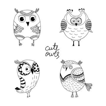 Hand-drawn cute cartoon owls on a white background. Vector illustration.