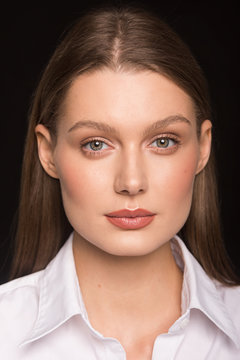 young girl.  beautiful girl.  office worker.  shirt.  light makeup. business