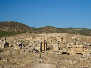 Fototapeta premium Ruins of the theater ancient Roman city of Hierapolis, Pamukkale, Denizli Province, Turkey.
