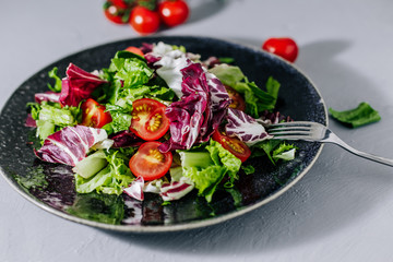 Mix healthy salad romaine,chard,spinash with tomatoes