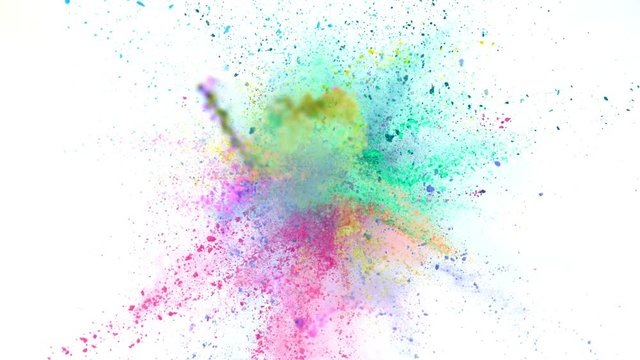 Super slowmotion shot of color powder explosions isolated on white background.
