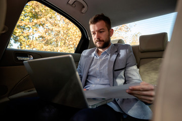 Man analyzing business data from his computer