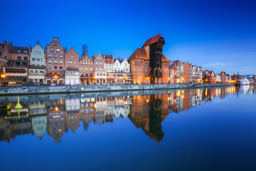 Fototapeta na wymiar Beautiful old town of Gdansk with historic Crane at Motlawa river, Poland