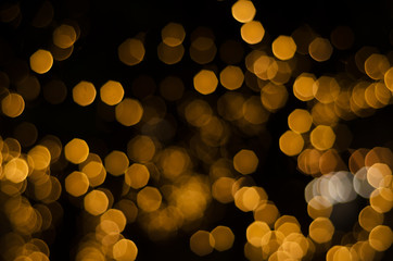 yellow bokeh abstract blurred light wallpaper backgrund.