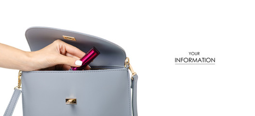 A hand put cosmetic lipstick in the female blue gray leather bag pattern on a white background...