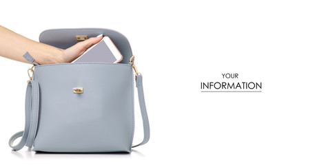 A hand put the phone in the female blue gray leather handbag pattern on a white background isolation