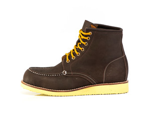 Men’s brown boot isolated on a white background.