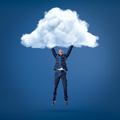 Businessman hanging in the air holding white cloud with both hands