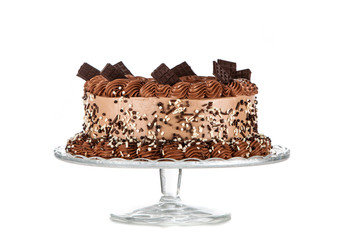 Decorated chocolate cake on dark background