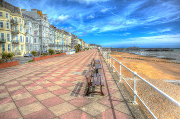 Hastings promenade and seafront with hotels and buildings East Sussex England in colourful HDR