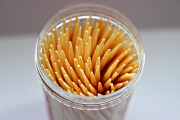 food material wood sharp yellow plastic white gray background many toothpick hygiene object clean form small macro smooth straight