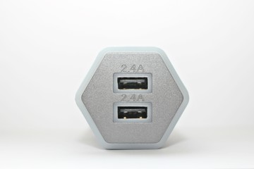 white background electronics appliances technology socket voltage current light black gray power two connection adapter plastic metal shadow gray office modern office input output usb wire two compute