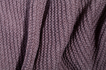 Knitted brown scarf texture.