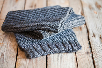 Fototapeta na wymiar knitted dark grey scarf
