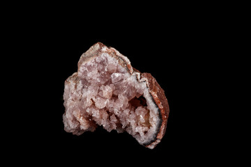 Macro mineral stone Pink Amethyst on a black background