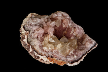 Macro mineral stone Pink Amethyst on a black background