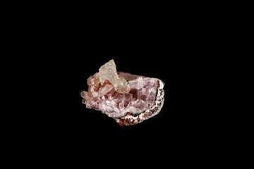 Macro mineral stone Pink Amethyst on a black background