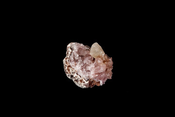 Macro mineral stone Pink Amethyst on a black background