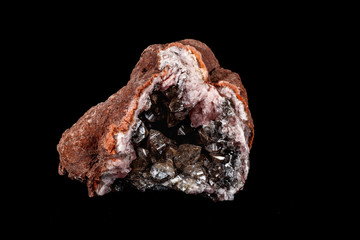 Macro mineral stone Pink Amethyst on a black background