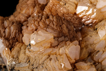 Macro Calcite mineral stone on sphalerite black background