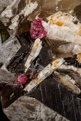 Macro mineral quartz mineral Tourmaline on Lepidolite black background