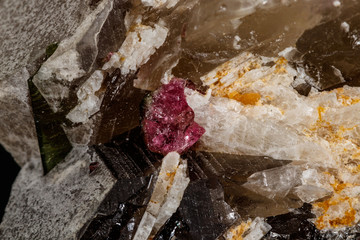 Macro mineral quartz mineral Tourmaline on Lepidolite black background
