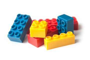 closeup of plastic bricks construction on white background