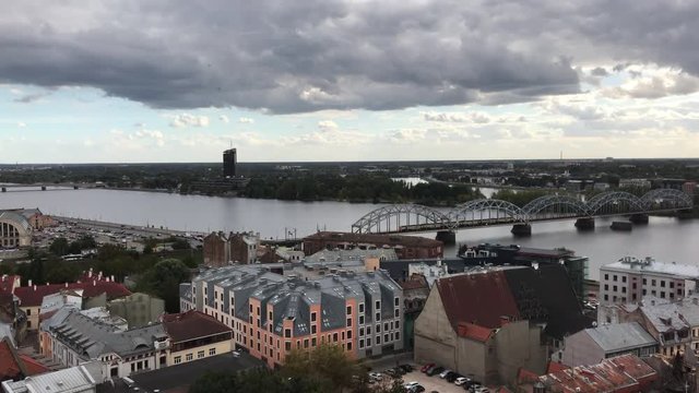 Aerial Riga olt town (cityscape above). Moving train