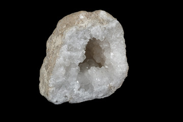 Macro mineral stone Quartz geode black background