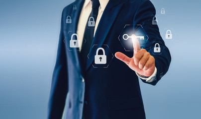 Businessman touching key virtual button.