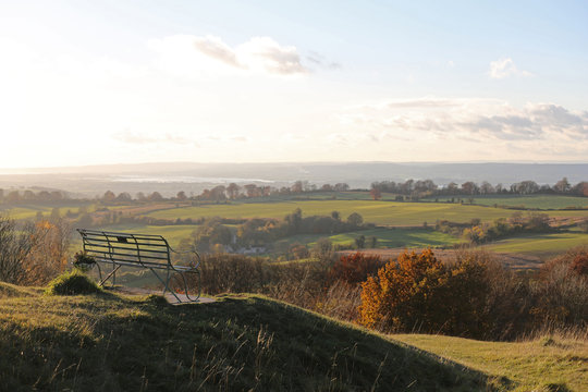 Seat overlooking Gloucestershire countryside